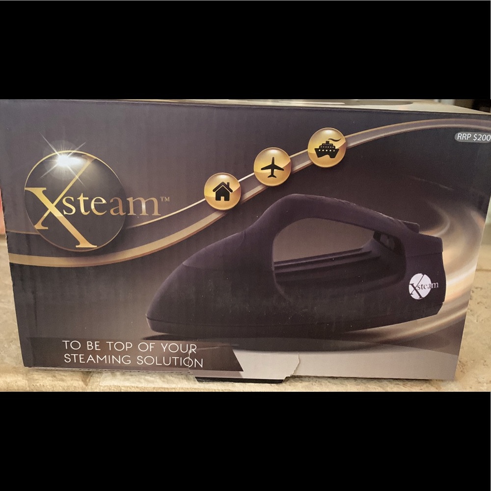 Xsteamer steamer- light as a paper plate. Brand new - never used - still in box